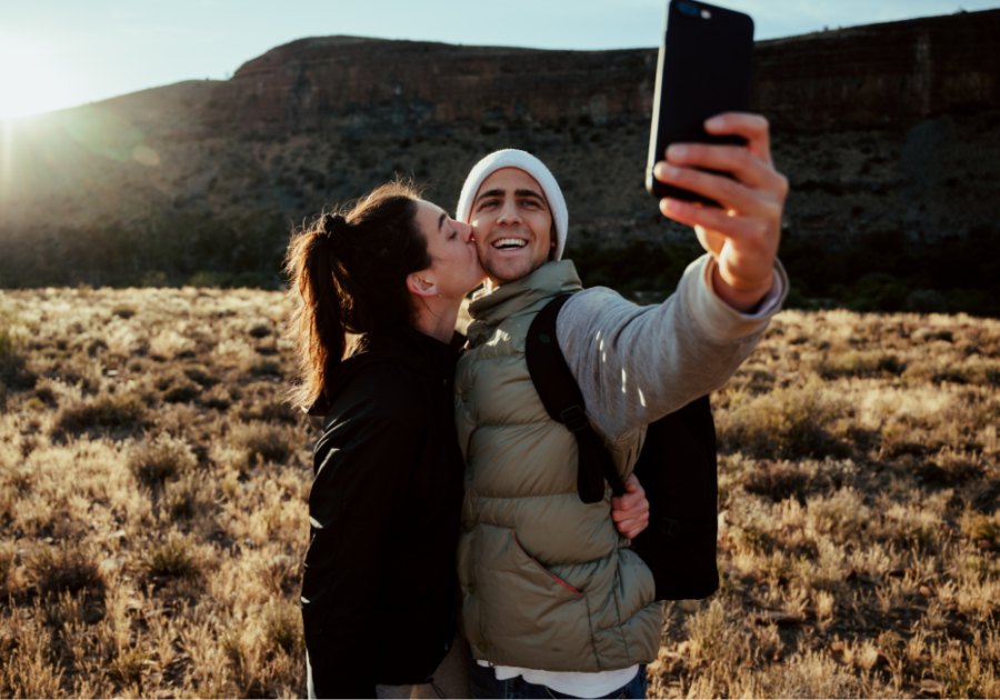 couple outdoors taking selfie Sagittarius Soulmate