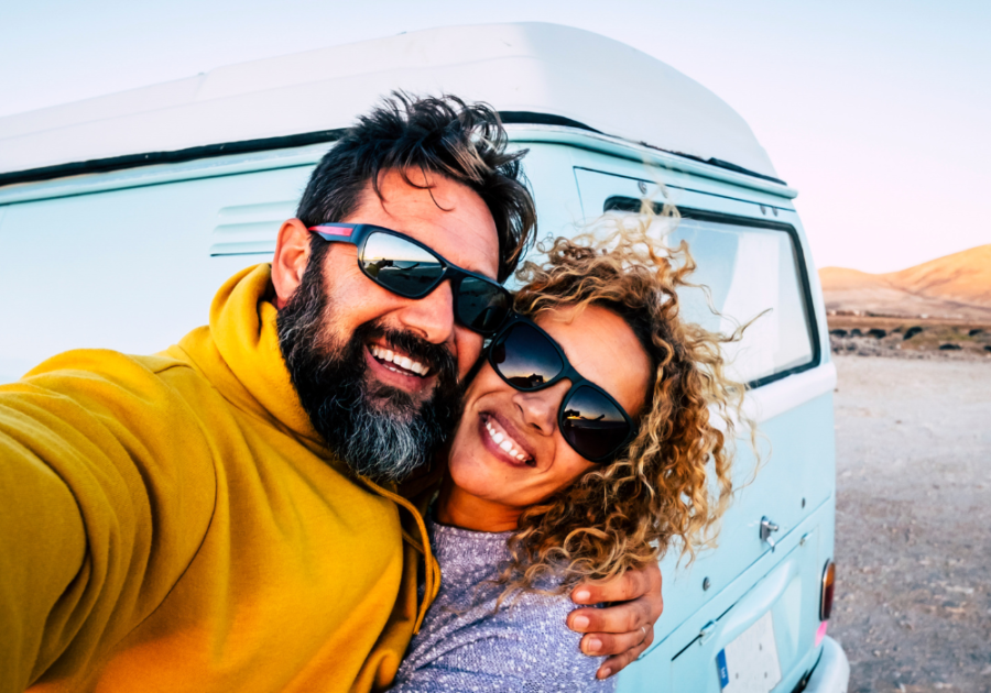 happy couple taking selfie, love letters to make him cry