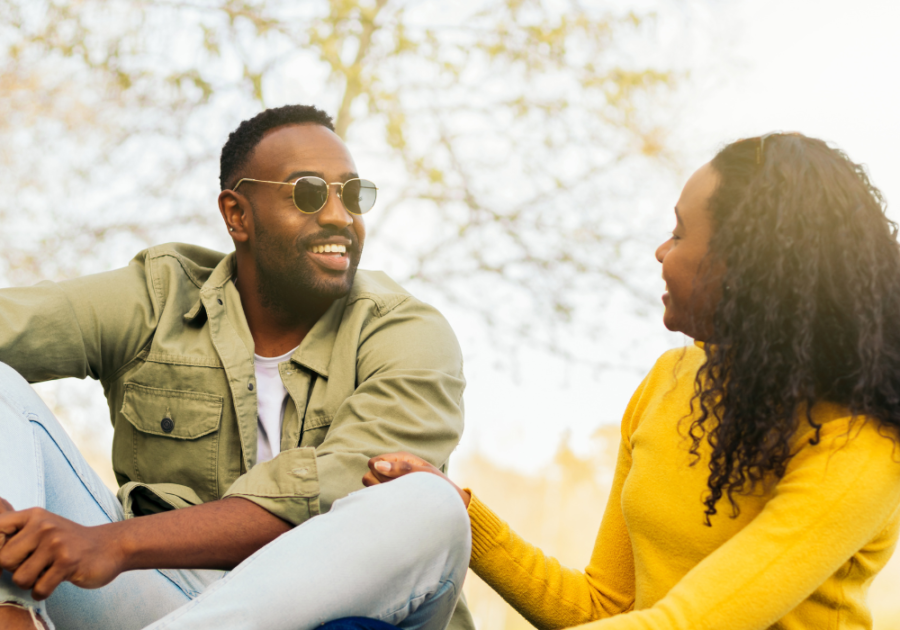 couple talking and smiling compliments for men