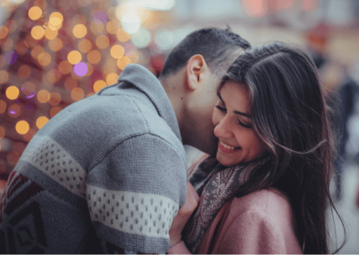 woman smiling man kissing her neck compliments for your man
